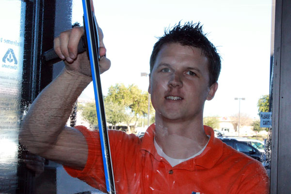 Josh cleaning windows in Queen Creek